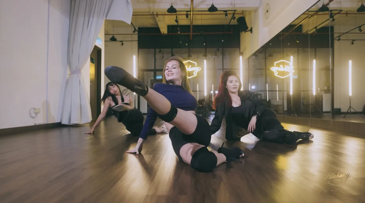 Dance pose on the studio floor by Ksenia Maltseva